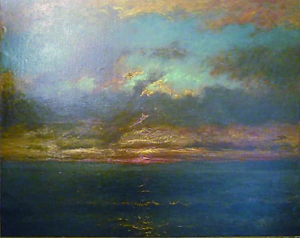 Soleil couchant sur un rivage.